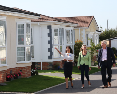 Quickmove sales consultant giving tour of a park home development